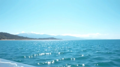 Expansive Blue Ocean Near Shoreline Under Clear Sky