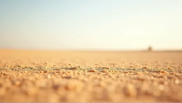 Expansive Fine Tan Particles Under Clear Sky