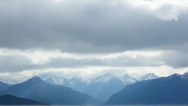 Expansive High Peaks Beneath Moody Gray Skies