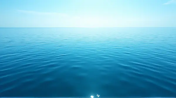 Expansive Ocean Horizon Under Bright Sky