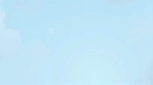 Wide pale azure sky filled with soft, billowy cloud formations viewed from a low angle emphasizing openness.