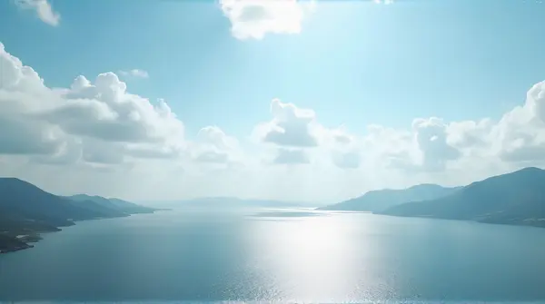 Expansive Shimmering Surface Under Vast Sky