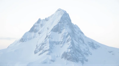 Frost-Covered Summit With Jagged Ridges
