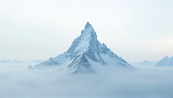 Frosted Jagged Summit Amid Misty Vapor Veils