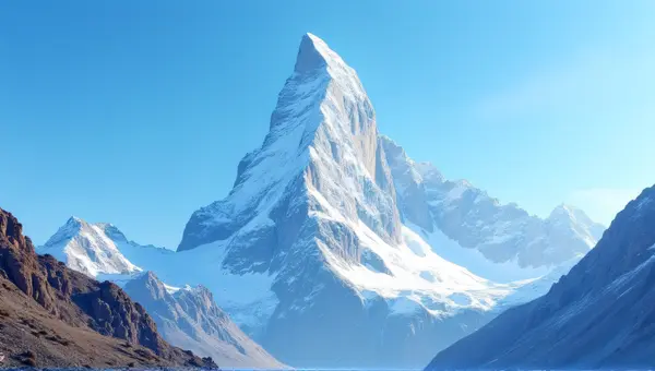 Frosted Peak Under Clear Blue Sky
