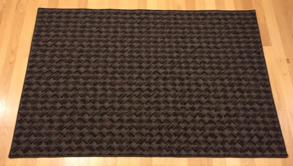 Geometric Patterned Rug On Oak Hardwood Floor