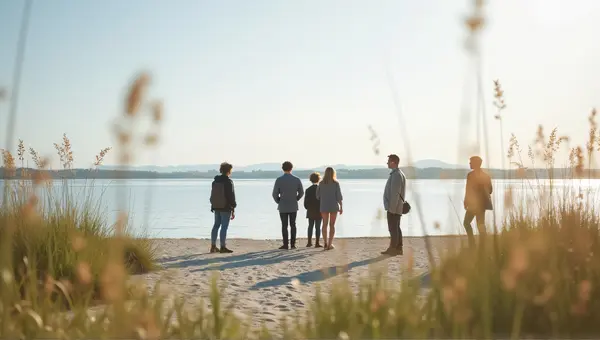 Group Gathering Beside Expansive Water Edge