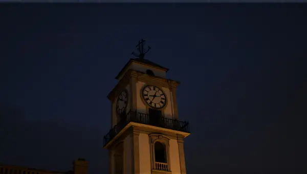 Historic Clock Facade With Soft Lighting