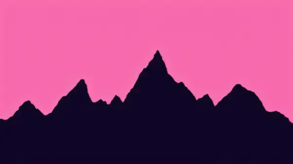 Silhouette of jagged mountains outlined against a bright pink sky from a low angle view.
