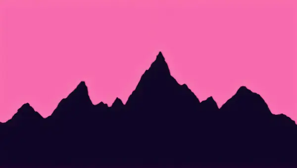 Jagged Mountain Range Silhouette Against Pink Sky