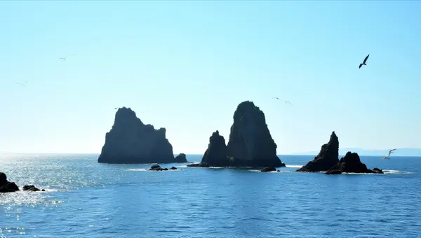 Jagged Rocky Islands Amid Shimmering Water