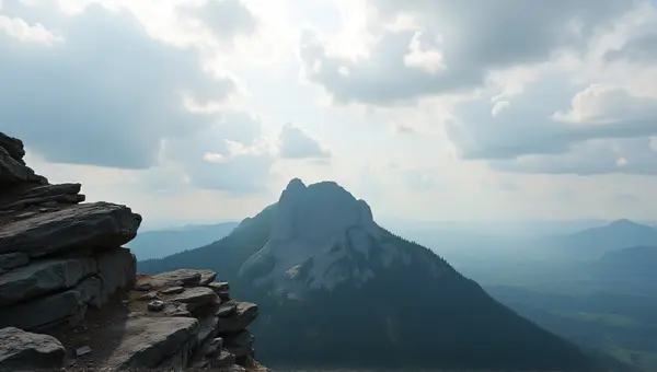 Jagged Rocky Peak Above Expansive Tree Canopy