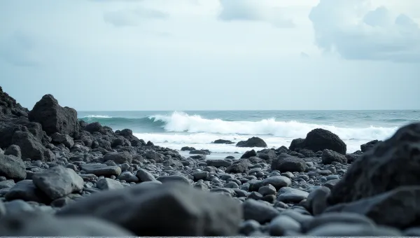 Jagged Shoreline With Crashing Surf And Expansive Sky
