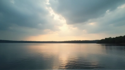 Lake Shore Under Overcast Sky At Dusk