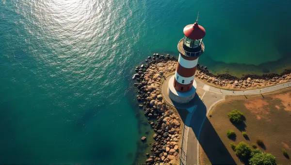 Lighthouse Overlooking Shimmering Coastline Landscape