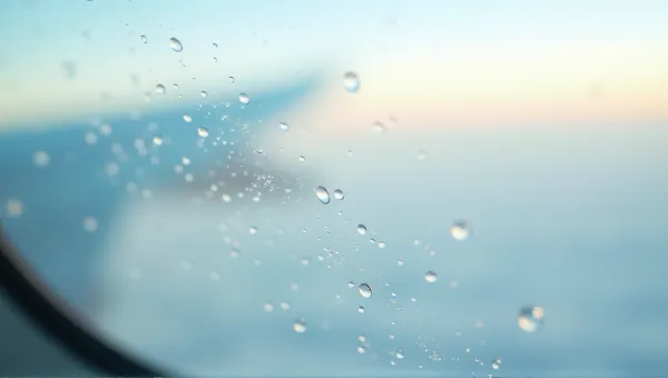 Macro View Of Glistening Beads On Aircraft Glass