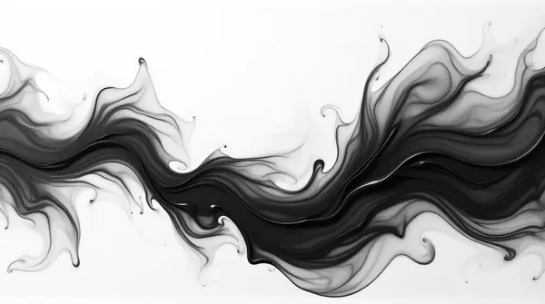 Black and white ink swirling with fluid movement on a flat surface under soft natural light