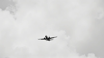 Monochrome Jet Gliding Over Soft Vapor Formations
