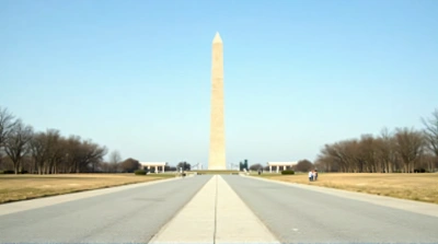 Monument Centered Under Clear Blue Sky