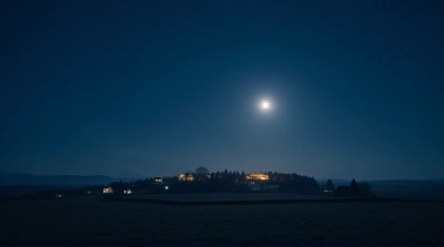 Moonlit Village Under Deep Blue Sky