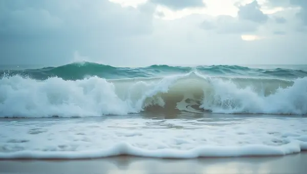 Ocean Swell Rolling Toward Coast With Foam