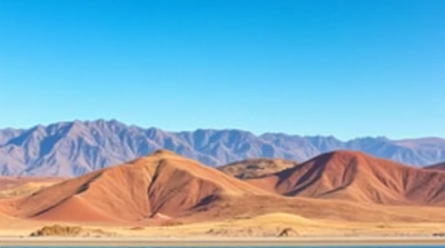Ochre And Slate Mountains Under Clear Blue Sky