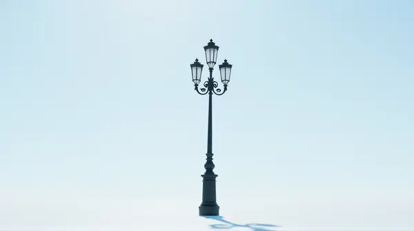 Ornate Black Metal Lamp Post Against Clear Sky