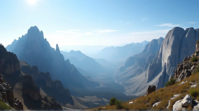 Panoramic Rocky Cliffs Under Bright Blue Sky