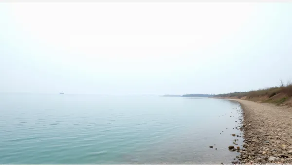 Rippling Water Surface Near Pebble Shoreline