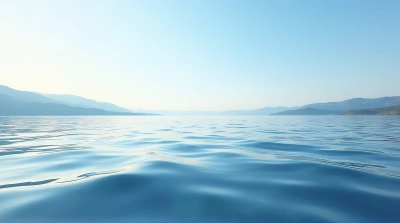 Rippling Water Surface Reflecting Clear Sky