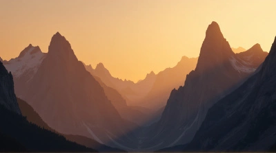 Rocky Peaks Under Warm Amber Sky