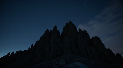 Rocky Summit Silhouette With Celestial Sky