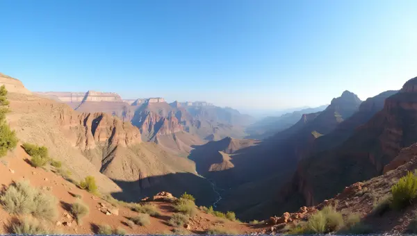 Rugged Earthy Peaks Under Clear Blue Sky