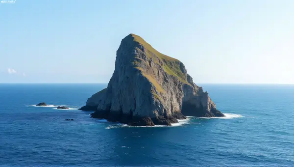 Rugged Rock Formation In Deep Blue Sea