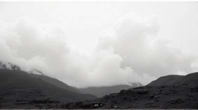 Rugged Terrain Under Pale Vapor Formations