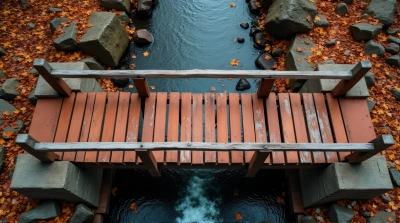 Rust-Colored Timber Crossing Over Water Channel