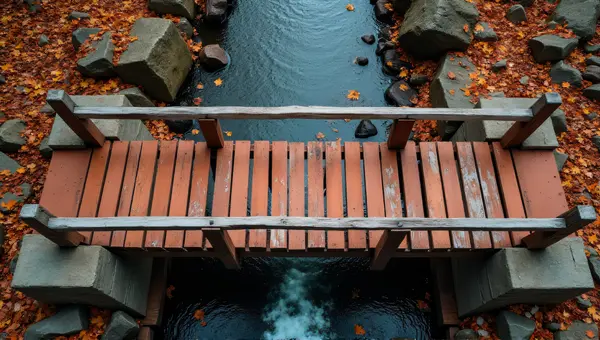 Rust-Colored Timber Crossing Over Water Channel