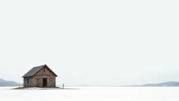 Rustic Timber Hut Amid Expansive White Terrain