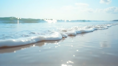 Saltwater Surges Rolling Toward Sandy Beach