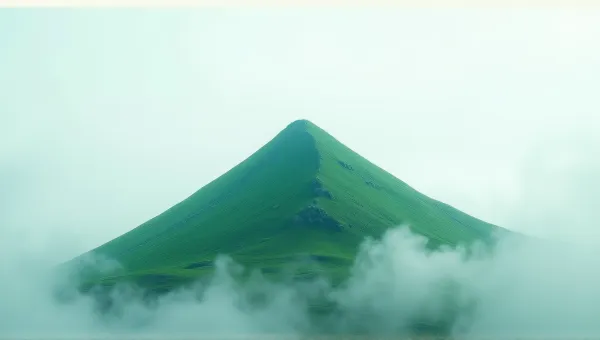 Sharp Emerald Peak Under Soft Overcast Sky