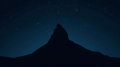 Silhouetted Summit Against Twinkling Night Sky