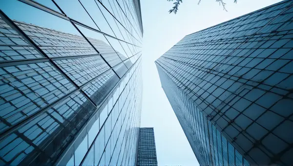 Skyscraper Mirror Facade Reflecting Cityscape
