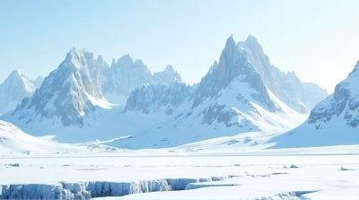 Snow-Covered Mountain Peaks Under Bright Daylight