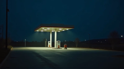 Solitary Gas Station At Night With Shadows