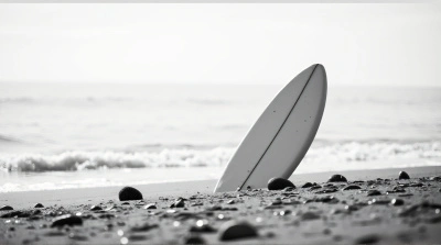 Solitary Surfboard On Textured Shoreline Scene