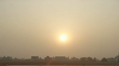 Sun Peeking Through Overcast Sky Landscape