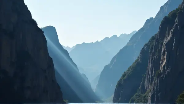 Sunlight Piercing Rocky Cliffs With Clear Sky