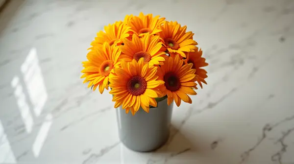 Sunlit Bouquet In Cylindrical Vase Overhead View
