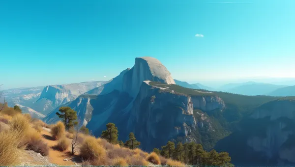 Sunlit Cliff Peak Under Clear Blue Sky