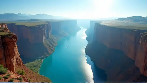 Sunlit Gorge Between Steep Cliffs Under Clear Sky
